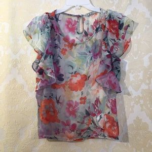 Beautiful flowing top with ruffle arms